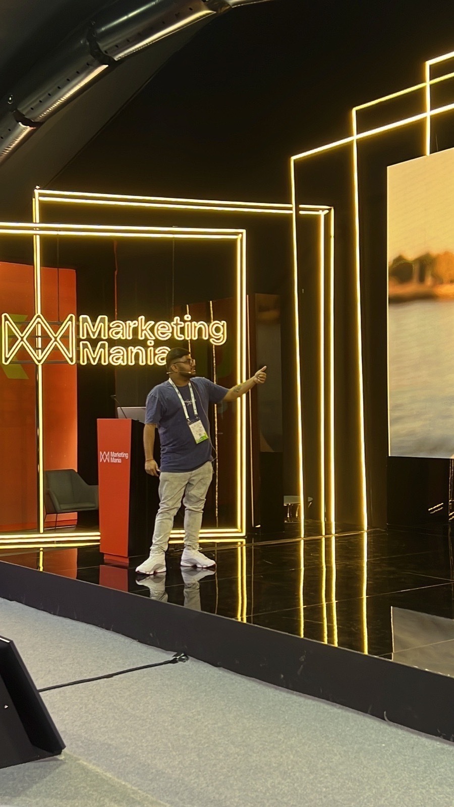 Kavin Kumar presenting on stage at Marketing Mania GITEX Global Dubai 2023