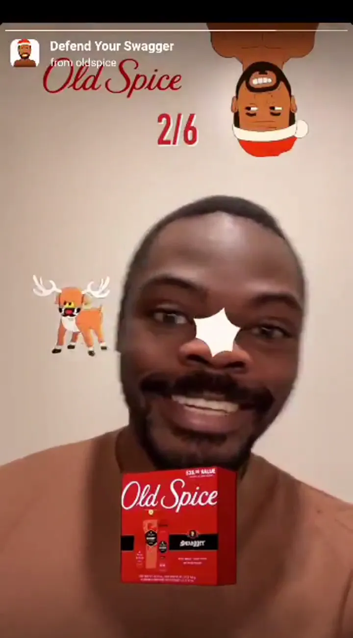 Old Spice Instagram AR game: a player knocks a falling reindeer away with his nose to protect an Old Spice gift box under his chin, scoring 2 of 6