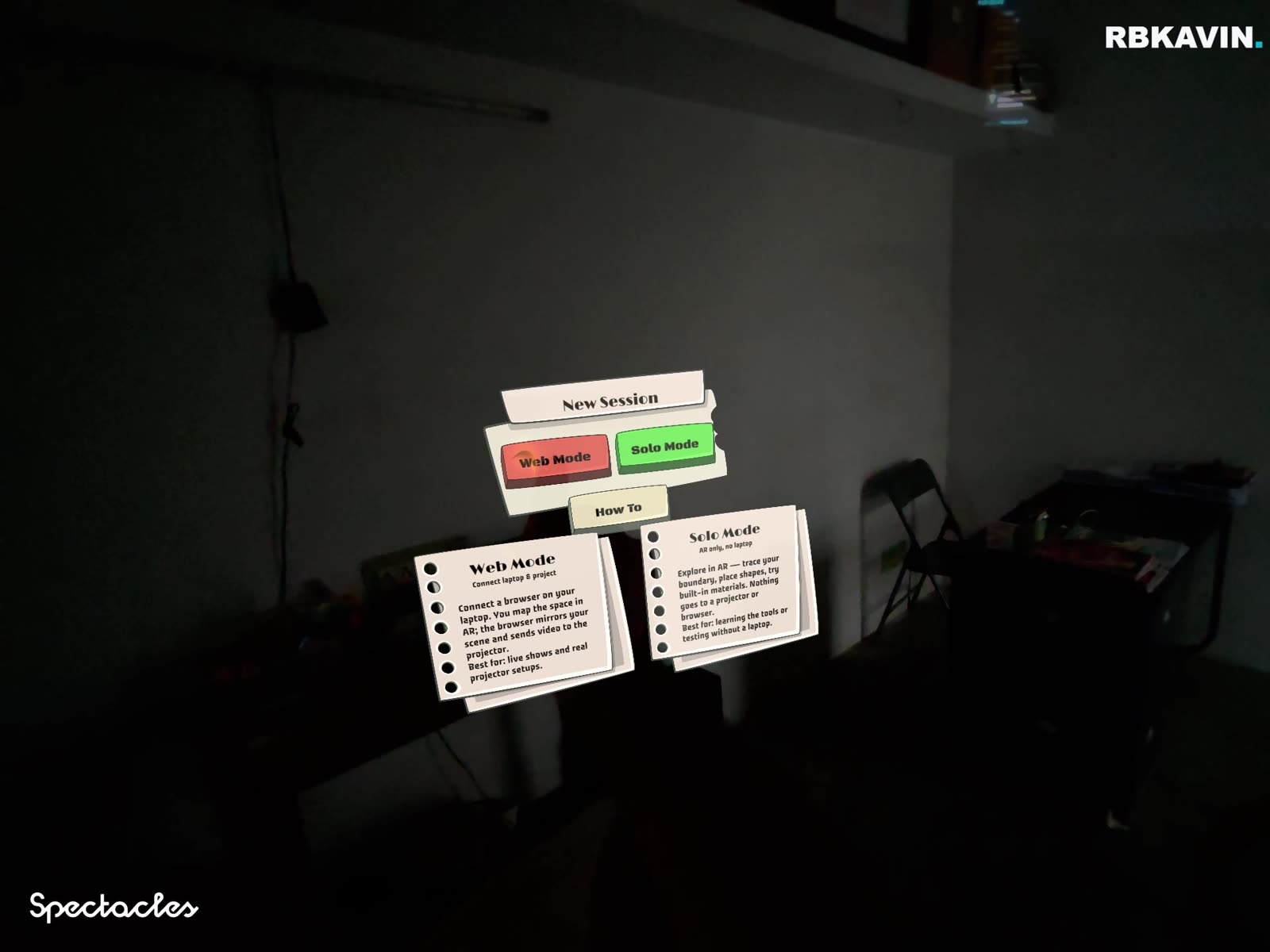 Spatial Mapper card-style menu (Web Mode, Solo Mode) sitting fixed in mid-air in a real room, viewed through Snap Spectacles.